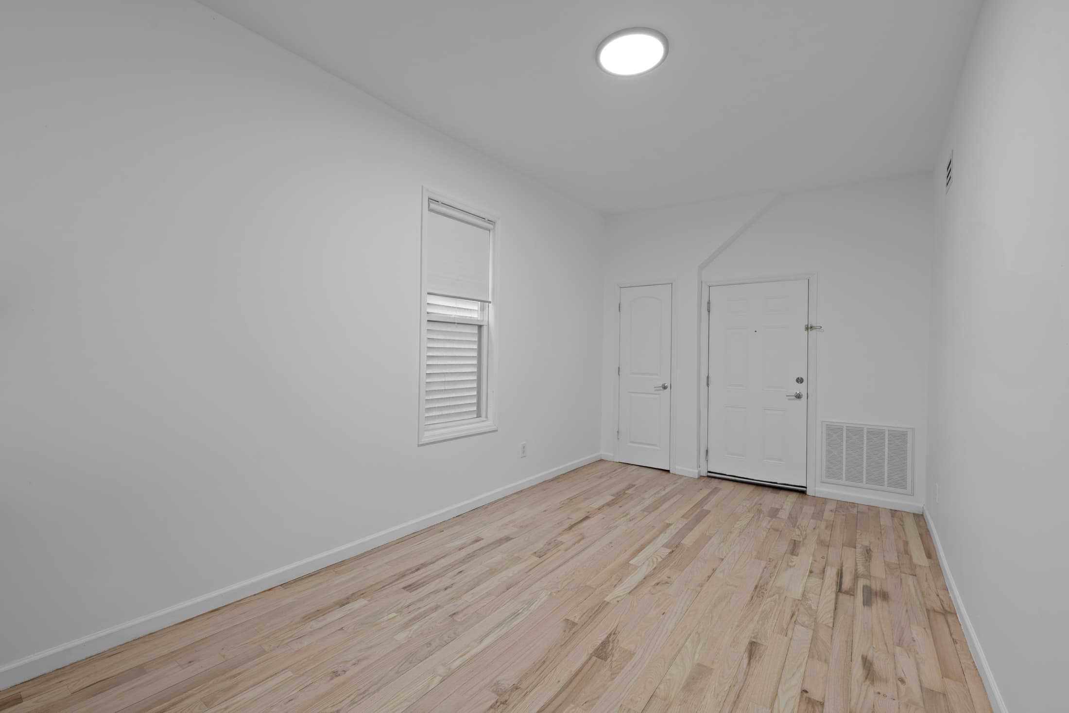 Bedroom with large window